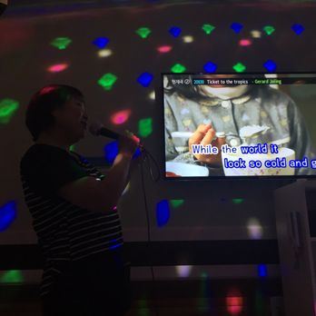 Muse Noraebang and Cafe - a woman playing a video game - Karaoke Near Me - Aurora, Colorado Muse Noraebang and Cafe - a woman playing a video game - Karaoke Near Me - Aurora, Colorado