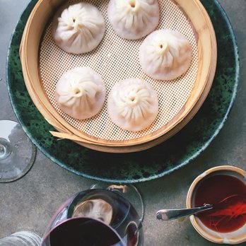 Wu Chow - Pork soup dumplings & vinegar topping - Dim Sum Near Me - Austin, Texas