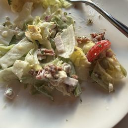 Iceberg Wedge Salad which they chopped at our request. Delicious! Iceberg Wedge Salad which they chopped at our request. Delicious!