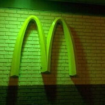 McDonald's - a brick wall and a neon sign - Burgers Near Me - Hobbs, New Mexico McDonald's - a brick wall and a neon sign - Burgers Near Me - Hobbs, New Mexico