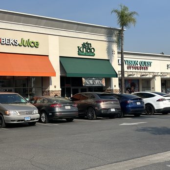 Kin Khao - Outside in the plaza of Raising Caine - Thai Near Me - Monrovia, California Kin Khao - Outside in the plaza of Raising Caine - Thai Near Me - Monrovia, California