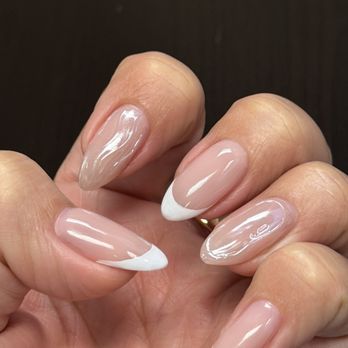 Marivanna Nails - Uneven shape and French, streaky white tip and bubbles on ring finger. - Nail Salons Near Me - Los Angeles, California