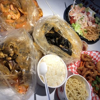 Ray's Crab Shack - Shrimp, clams, mussels in ultimate power mild spicy, rice, garlic noodles, seafood salad, fried combination basket - Seafood Near Me - Newark, California Ray's Crab Shack - Shrimp, clams, mussels in ultimate power mild spicy, rice, garlic noodles, seafood salad, fried combination basket - Seafood Near Me - Newark, California
