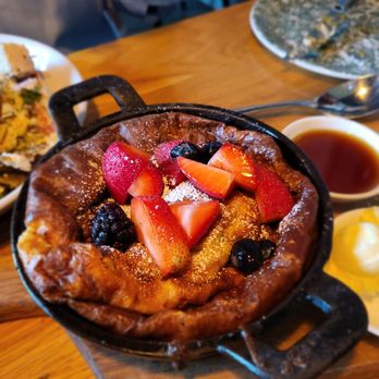 Farm Bar - Ravenswood - Dutch Baby (Puffy German-style pancake, baked in a skillet. Served with butter and grade A Canadian maple syrup. - Salad Near Me - Chicago, Illinois Farm Bar - Ravenswood - Dutch Baby (Puffy German-style pancake, baked in a skillet. Served with butter and grade A Canadian maple syrup. - Salad Near Me - Chicago, Illinois