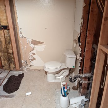 Visionary Design & Construction - The other half of the bathroom prior to renovation. A mess - General Contractors Near Me