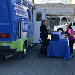 Oodles of Noodles Festival - Saturday, June 1, 2019: Greater Nevada Credit Union Mobile Branch truck and table.