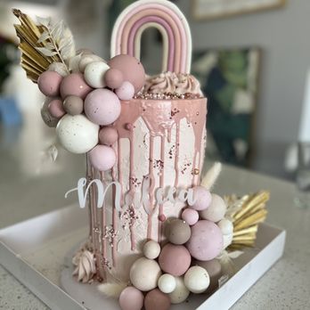 Cake - Gourmet Sugar Service - a pink cake with white icing and decorations - Desserts Near Me Cake - Gourmet Sugar Service - a pink cake with white icing and decorations - Desserts Near Me