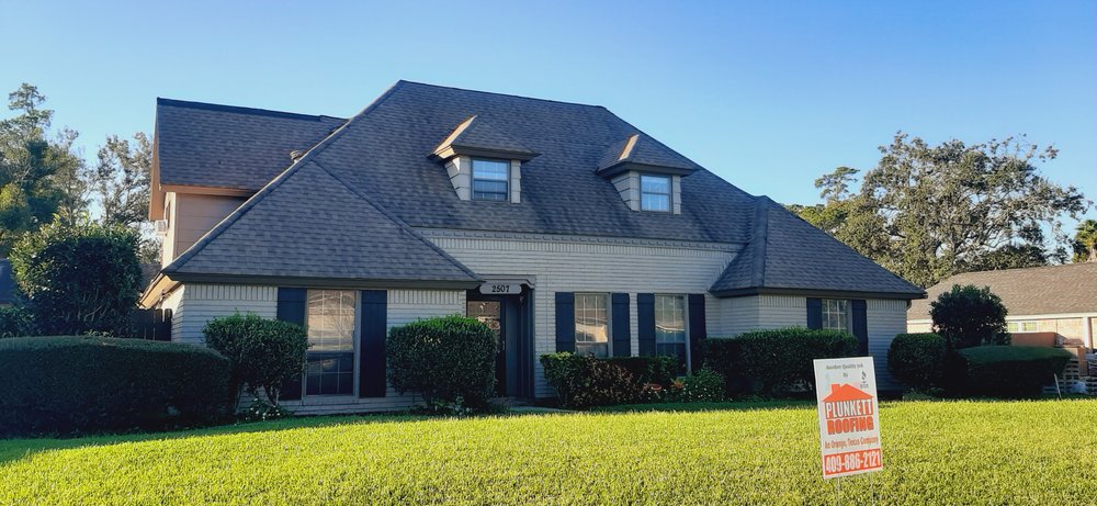 Slide of Plunkett Roofing