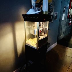 Happy's Stork Lounge and Liquor - There's a popcorn machine now!