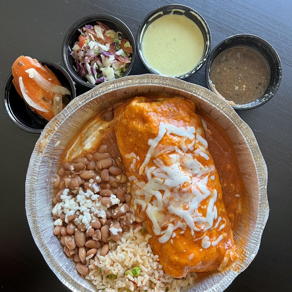 Taco Mesa - Al Pastor Burrito (made into a wet burrito). Picked up salsas and pickled vegetables from their salsa bar. Avocado salsa is incredible! - Mexican Near Me - Ladera Ranch, California Taco Mesa - Al Pastor Burrito (made into a wet burrito). Picked up salsas and pickled vegetables from their salsa bar. Avocado salsa is incredible! - Mexican Near Me - Ladera Ranch, California