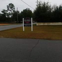 Pilcher's Barber Shop - Sign by road