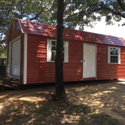 JM Portable Buildings - 12' x 24' Red Classic Barn with garage door and side door
