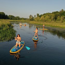 That's Wassup Stand Up Paddle Boarding - Paddle the Huron River at proud lake state park. Our new location for 2022!