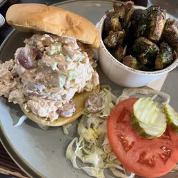 Smoked Chicken Salad Sandwich. Side of Fried Brussels, apple glaze. Smoked Chicken Salad Sandwich. Side of Fried Brussels, apple glaze.
