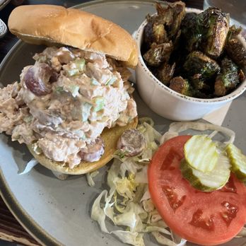 Queenie's - Smoked Chicken Salad Sandwich. Side of Fried Brussels, apple glaze. - Southern Near Me - Canton, Georgia Queenie's - Smoked Chicken Salad Sandwich. Side of Fried Brussels, apple glaze. - Southern Near Me - Canton, Georgia