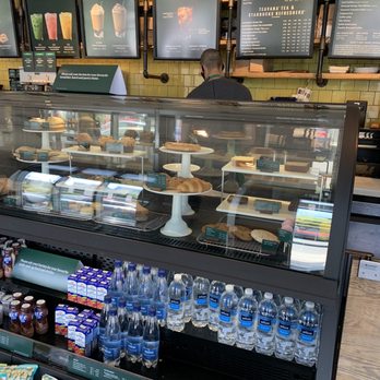 Starbucks - a display of coffee and pastries in a coffee shop - Coffee & Tea Near Me - Toronto, Ontario Starbucks - a display of coffee and pastries in a coffee shop - Coffee & Tea Near Me - Toronto, Ontario