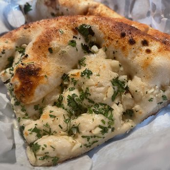 21 Spices by Chef Asif - Super oily garlic naan - Indian Near Me - Naples, Florida 21 Spices by Chef Asif - Super oily garlic naan - Indian Near Me - Naples, Florida