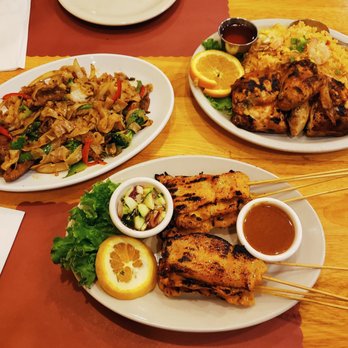 Thai BBQ - Sooo good! Left to right: drunken noodles, chicken satay, BBQ chicken dinner - Thai Near Me - Union City, California Thai BBQ - Sooo good! Left to right: drunken noodles, chicken satay, BBQ chicken dinner - Thai Near Me - Union City, California