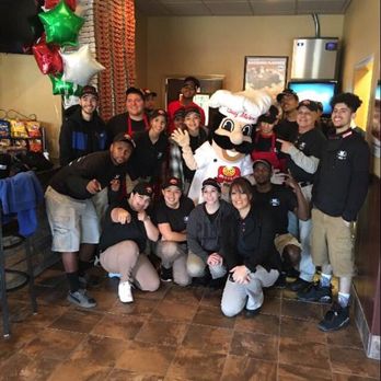 Marco's Pizza - a group of people posing for a picture - Pizza Near Me - Spring Hill, Florida Marco's Pizza - a group of people posing for a picture - Pizza Near Me - Spring Hill, Florida
