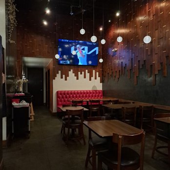 Oki Sushi - Inside the restaurant - Four televisions are set to various sports - Japanese Near Me - Rocklin, California