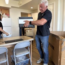 Helping Hands Relocation - John moving our things into the new apartment