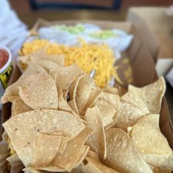 Tito's Tacos - The complimentary chips and the famous Tito's tacos