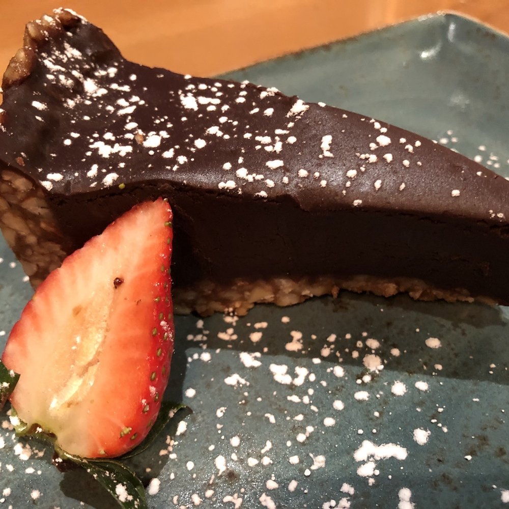 Milestones Restaurants - Chocolate ganache with walnut crust - Canadian (New) Near Me - West Vancouver, British Columbia Milestones Restaurants - Chocolate ganache with walnut crust - Canadian (New) Near Me - West Vancouver, British Columbia