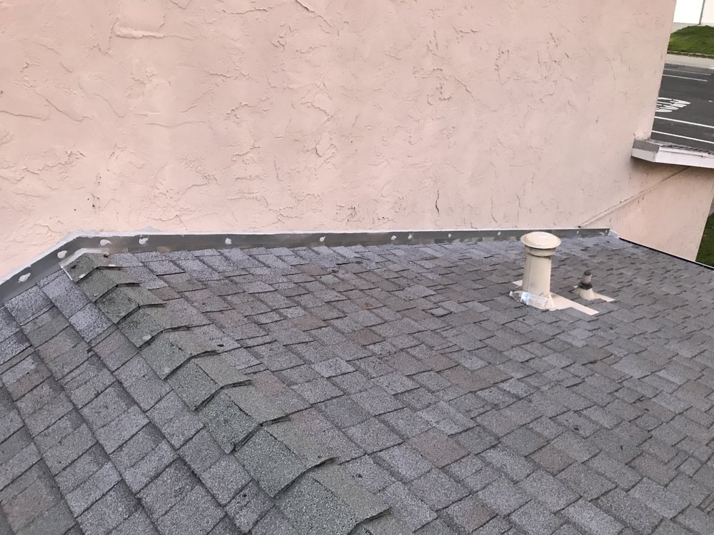 Slide of Shield Roofing