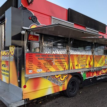 Cabañas Tacos - a man standing in front of a food truck - Food Trucks Near Me - Santa Ana, California