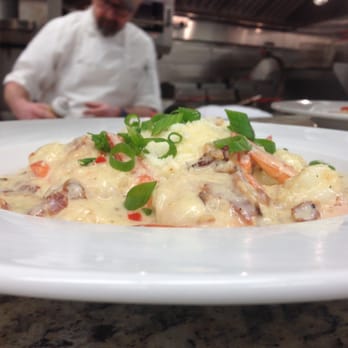 Savannah And Company - Chef Sean preparing some shrimp & grits - Bars Near Me - Cortlandt, New York Savannah And Company - Chef Sean preparing some shrimp & grits - Bars Near Me - Cortlandt, New York
