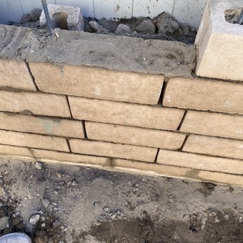 DDJ Construction - Dirt inside the bricks - General Contractors Near Me