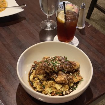 Fulton St. Bistro & Bar - a bowl of food on a table - French Near Me - New Orleans, Louisiana