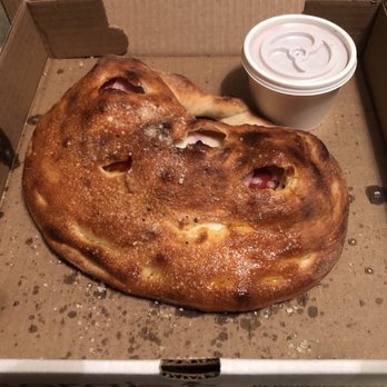 Sergio's - Calzone Classico. Ham mozzarella ricotta and I added pepperoni with a side of sauce to go. - Pizza Near Me - Midlothian, Virginia Sergio's - Calzone Classico. Ham mozzarella ricotta and I added pepperoni with a side of sauce to go. - Pizza Near Me - Midlothian, Virginia