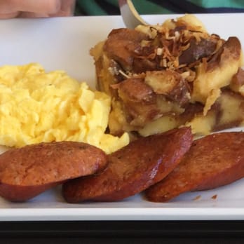 Anuenue Cafe - Coconut bread pudding, eggs & Portuguese sausage. - Cafes Near Me - Koloa, Hawaii