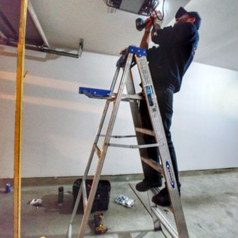Precise Garage Doors Services - Leo working hard - Garage Door Services Near Me - San Diego, California