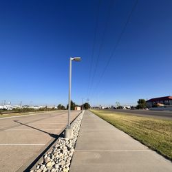 Lovington Highway Health Walk - Parking lot across from La Quinta Inn (8/30/2023). The walking path is on the right.