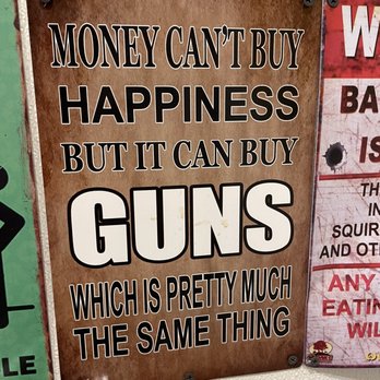 Calloway's Restaurant & Bar - a sign that says money can't buy happiness but it can buy guns which is pretty - American Near Me - West Creek, New Jersey Calloway's Restaurant & Bar - a sign that says money can't buy happiness but it can buy guns which is pretty - American Near Me - West Creek, New Jersey