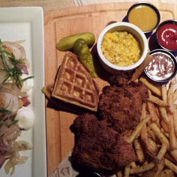 MKT - Cheddar perogies and buttermilk fried chicken with waffles - Gastropubs Near Me - Edmonton, Alberta