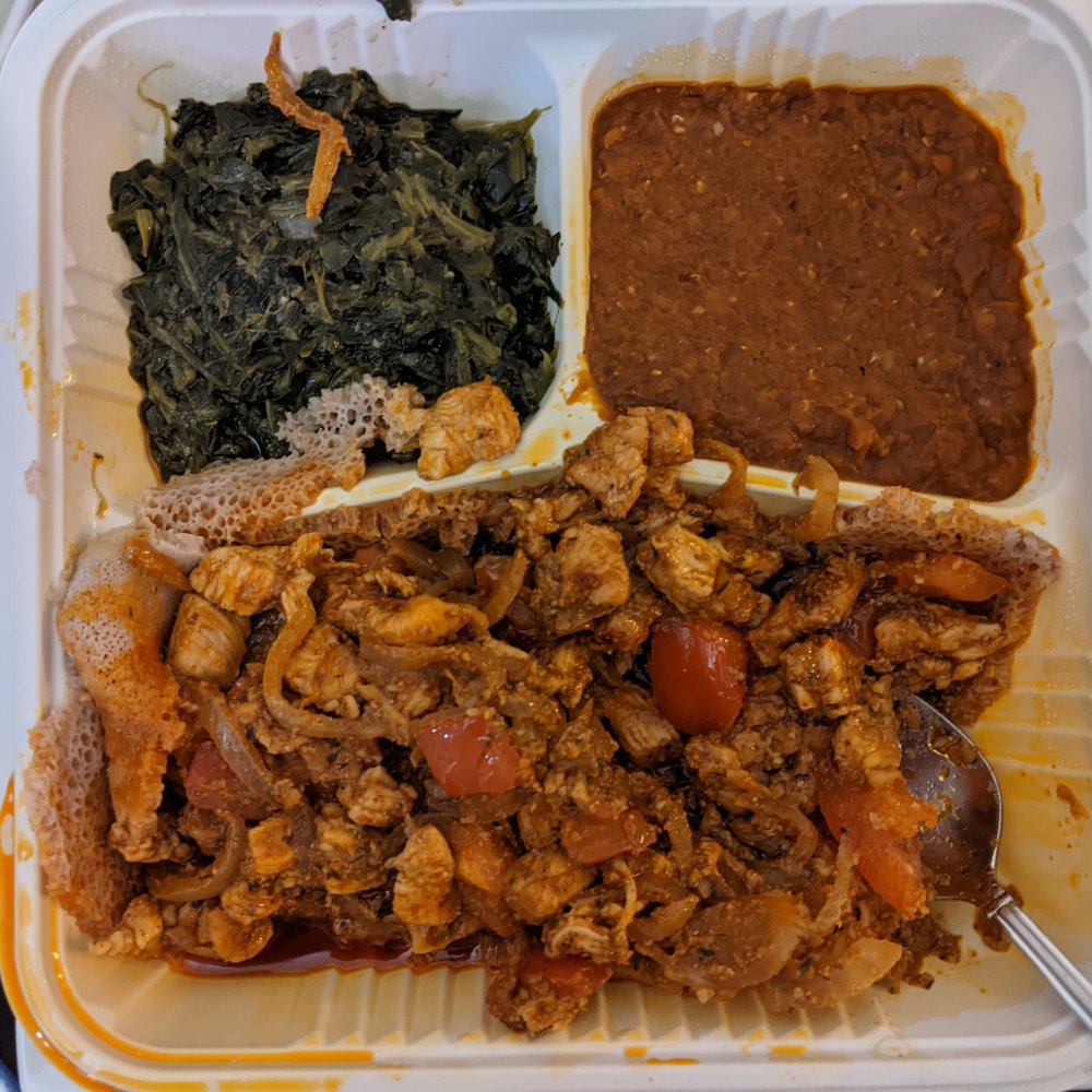 Keren Restaurant - Takeout box of Special Tibs with Chicken (previously covered in enjera) - Ethiopian Near Me - Washington, DC, District of Columbia Keren Restaurant - Takeout box of Special Tibs with Chicken (previously covered in enjera) - Ethiopian Near Me - Washington, DC, District of Columbia