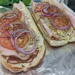 MOMMYO DELI - This is Rick's The weapon two meats lettuce, tomatoes onions oil and vinegar