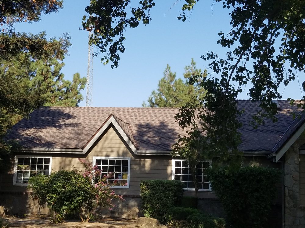 Slide of Green's Roofing