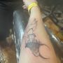 Photo of Two Graves Tattoo Studio