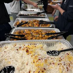 Rice, chicken tikka, beef skewers and lamb.