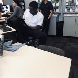 Verizon wireless store - Rude customer service, sitting there like this and cursing filling in our info, oh and we are with the kids too. UNBELIEVABLE