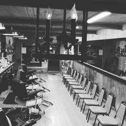 Glenn's Barber Shop On Main - Black and white photo from back.