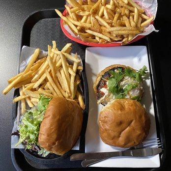 The Burger Stand - Classic burger with regular fries and Shakshuka with truffle fries - Burgers Near Me - Lawrence, Kansas The Burger Stand - Classic burger with regular fries and Shakshuka with truffle fries - Burgers Near Me - Lawrence, Kansas