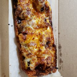 Domino's Pizza - They called this BBQ chicken. It was completely dried out.