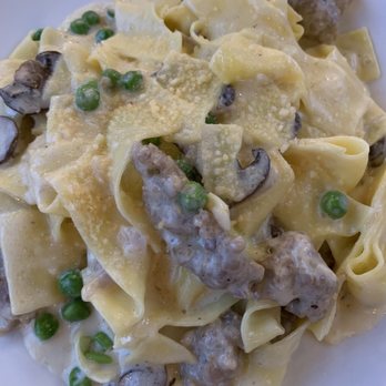The Lowery Bar & Kitchen - Pappardelle Pasta with sweet sausage, peas mushrooms & light cream sauce - New American Near Me - Sunnyside, New York The Lowery Bar & Kitchen - Pappardelle Pasta with sweet sausage, peas mushrooms & light cream sauce - New American Near Me - Sunnyside, New York