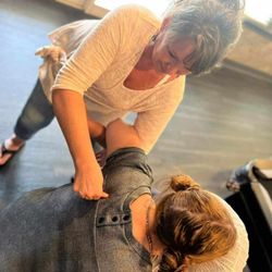 Giving sample chair massages at a local businesswomen's meeting. 7062496508 Book me for your Employee Appreciation Day!