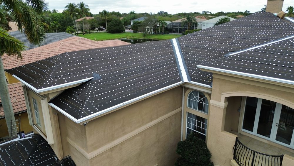 Slide of Friendly Roofing